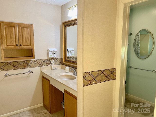 bathroom featuring vanity and tile patterned floors
