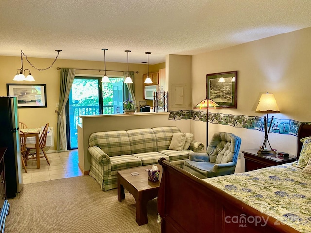 living room featuring a textured ceiling, light tile patterned flooring, and light carpet