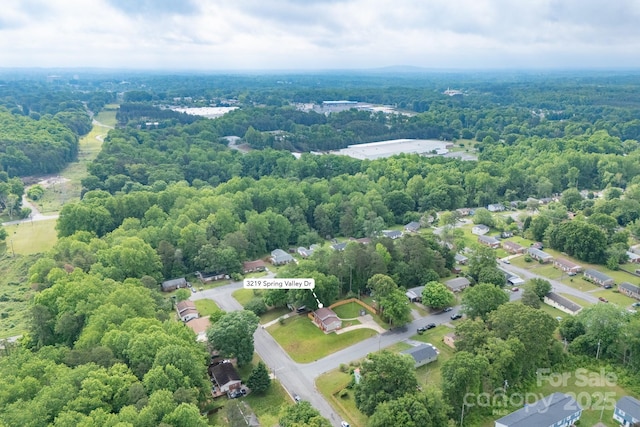 bird's eye view featuring a view of trees