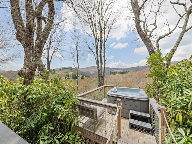 96 Evergreen Galax Ln, Maggie Valley, NC 28751 - deck with a hot tub and a mountain view
