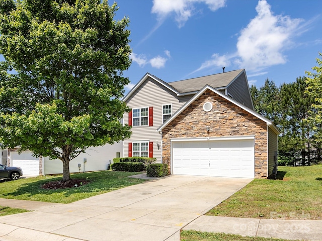 521 Ellingsworth Ln, Charlotte, NC 28214 - view of front of property with stone siding, concrete driveway, a front yard, and an attached garage