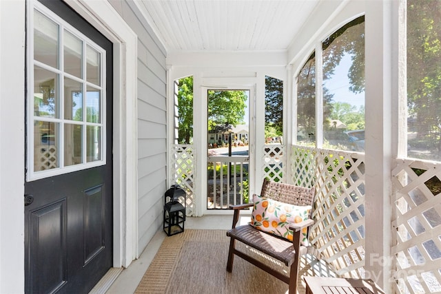 sunroom featuring a healthy amount of sunlight