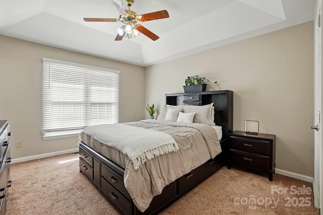 2379 Whitley Rd, Fort Mill, SC 29708 - bedroom featuring light carpet, baseboards, a tray ceiling, and ceiling fan
