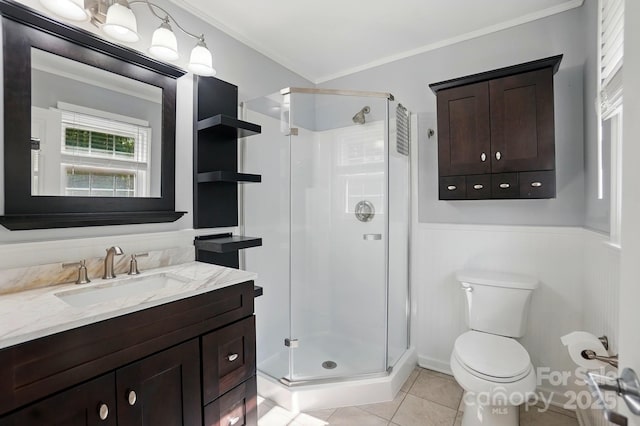 2379 Whitley Rd, Fort Mill, SC 29708 - bathroom featuring crown molding, a stall shower, toilet, vanity, and tile patterned flooring