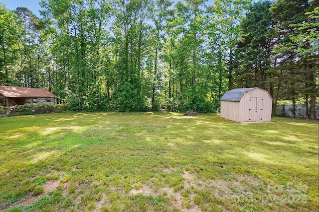 2379 Whitley Rd, Fort Mill, SC 29708 - view of yard featuring a storage unit and an outbuilding
