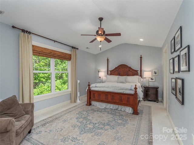 bedroom featuring baseboards, light carpet, vaulted ceiling, and recessed lighting