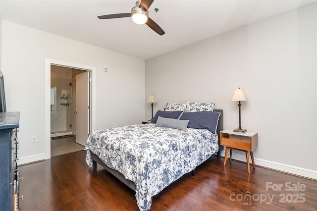 bedroom featuring baseboards, a ceiling fan, ensuite bath, and wood finished floors