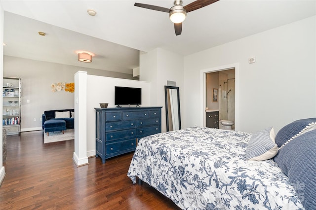 bedroom featuring dark wood-style flooring, baseboards, a ceiling fan, and ensuite bathroom