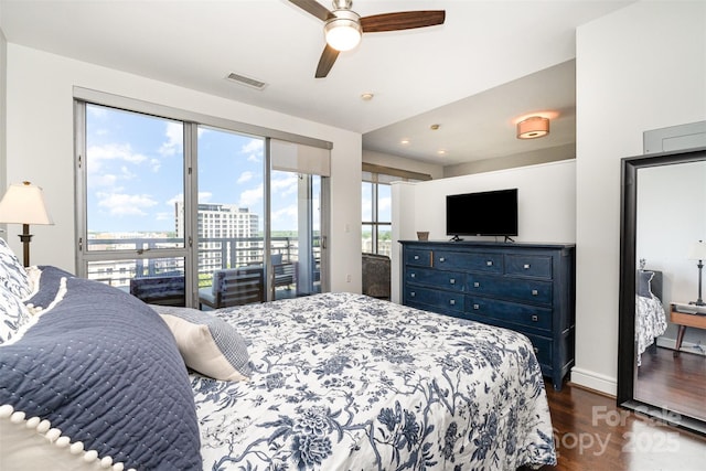 bedroom with a ceiling fan, access to exterior, visible vents, baseboards, and dark wood-style floors
