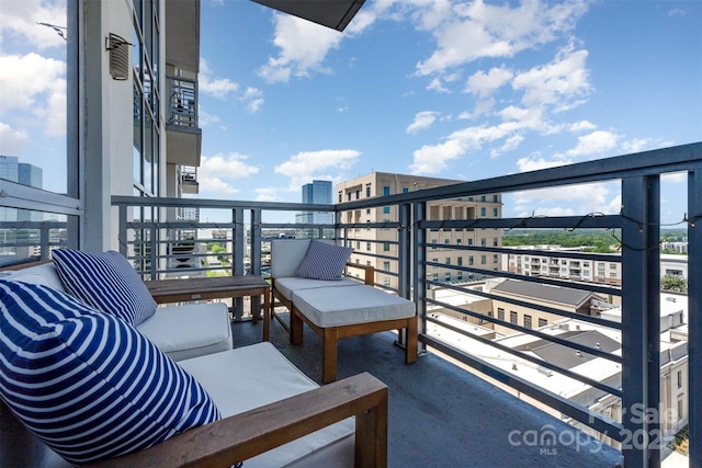 balcony featuring a city view