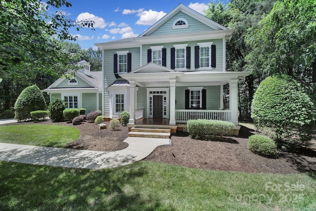 128 Spears Creek Dr, Mooresville, NC 28117 - neoclassical / greek revival house with a porch and a front lawn