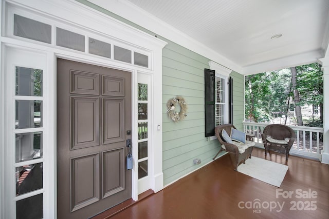 128 Spears Creek Dr, Mooresville, NC 28117 - view of exterior entry with a porch
