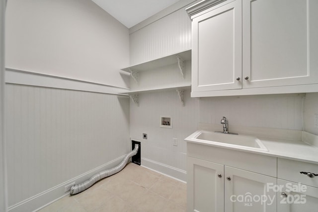128 Spears Creek Dr, Mooresville, NC 28117 - washroom featuring electric dryer hookup, hookup for a washing machine, cabinet space, light tile patterned floors, and baseboards
