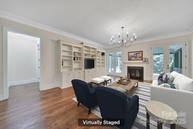 128 Spears Creek Dr, Mooresville, NC 28117 - living room featuring dark wood finished floors, crown molding, baseboards, french doors, and a chandelier