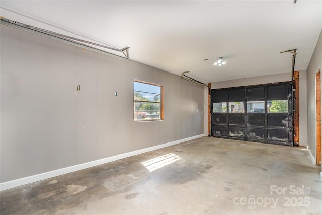 garage with baseboards