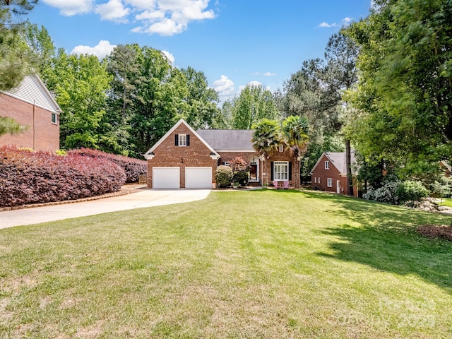 view of front of house with a garage, driveway, a front lawn, and brick siding