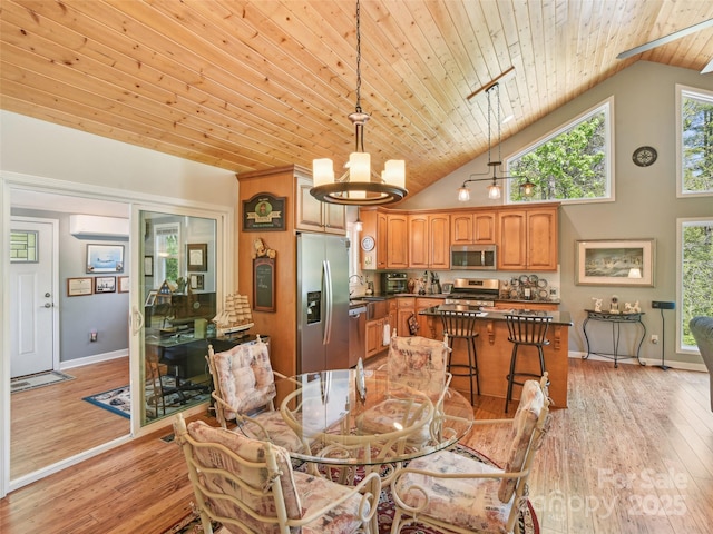 dining area with wood ceiling, light wood finished floors, high vaulted ceiling, and a notable chandelier