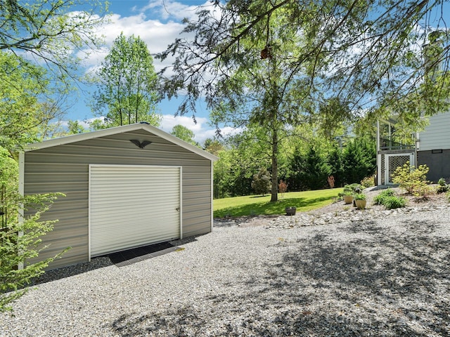detached garage with a shed