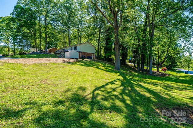 1018 Autumn Ln, Hickory, NC 28602 - view of yard with driveway