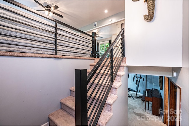 1018 Autumn Ln, Hickory, NC 28602 - staircase featuring a ceiling fan and carpet