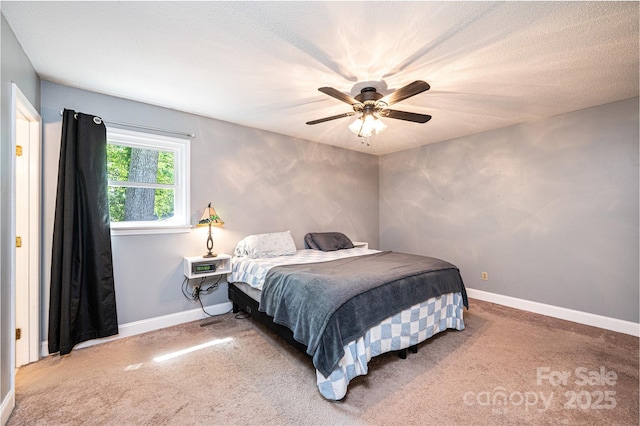 1018 Autumn Ln, Hickory, NC 28602 - carpeted bedroom featuring baseboards and ceiling fan
