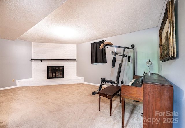 1018 Autumn Ln, Hickory, NC 28602 - interior space with baseboards, carpet, a brick fireplace, and a textured ceiling
