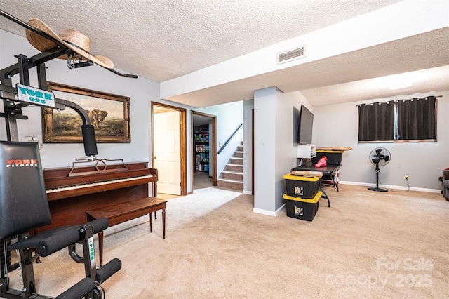 1018 Autumn Ln, Hickory, NC 28602 - sitting room featuring a textured ceiling, carpet, stairs, baseboards, and visible vents