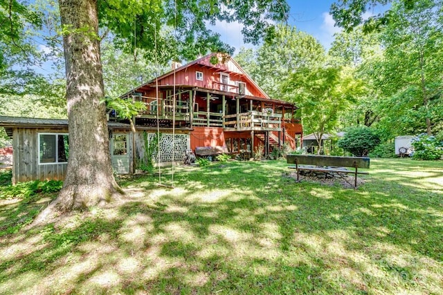 76 Archer Rd, Saluda, NC 28773 - back of property with a yard, stairs, and a wooden deck