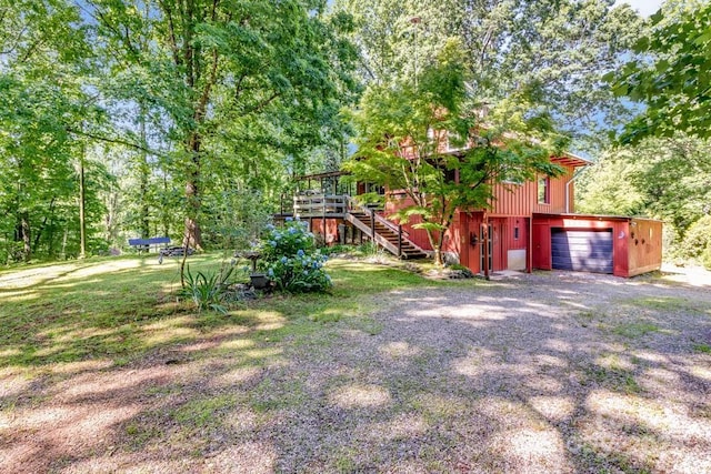 76 Archer Rd, Saluda, NC 28773 - view of yard with stairway, driveway, and a deck