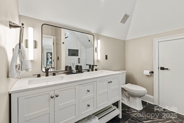 full bath with a sink, toilet, a shower stall, lofted ceiling, and visible vents