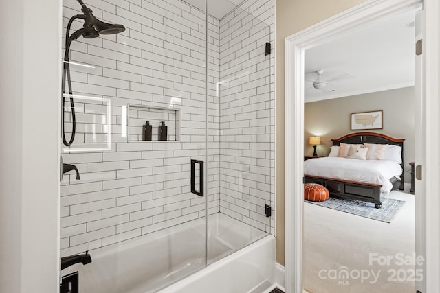 full bath featuring combined bath / shower with glass door, ornamental molding, a ceiling fan, and ensuite bath