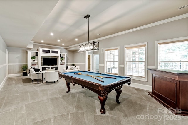 rec room with crown molding, billiards, and light carpet