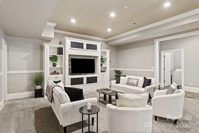 living room with crown molding, washer / clothes dryer, recessed lighting, baseboards, and visible vents