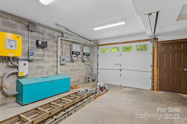 garage featuring concrete block wall