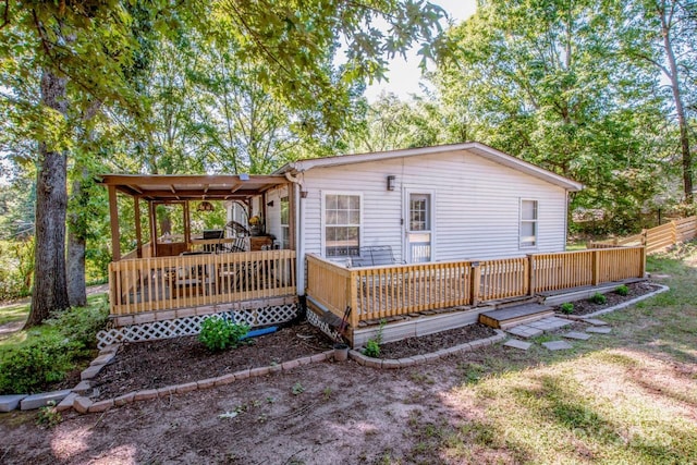 7733 Skyline Dr, Sherrills Ford, NC 28673 - rear view of house featuring a deck and fence
