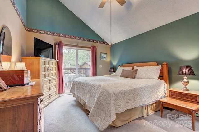 39 Oak Ct, Fletcher, NC 28732 - bedroom featuring access to exterior, light colored carpet, high vaulted ceiling, and ceiling fan