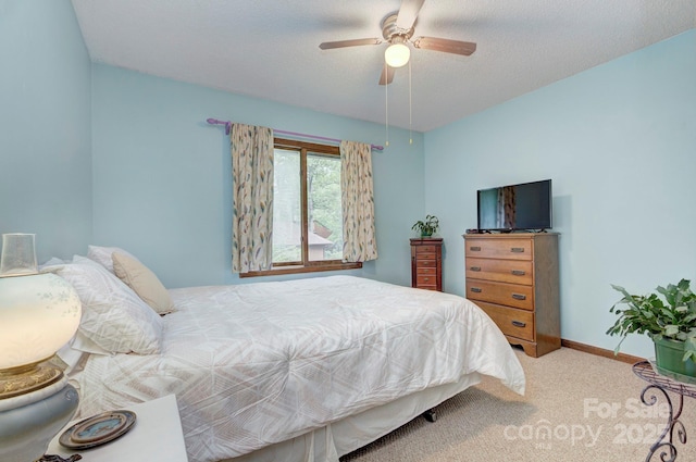 39 Oak Ct, Fletcher, NC 28732 - bedroom featuring carpet flooring, baseboards, and a ceiling fan