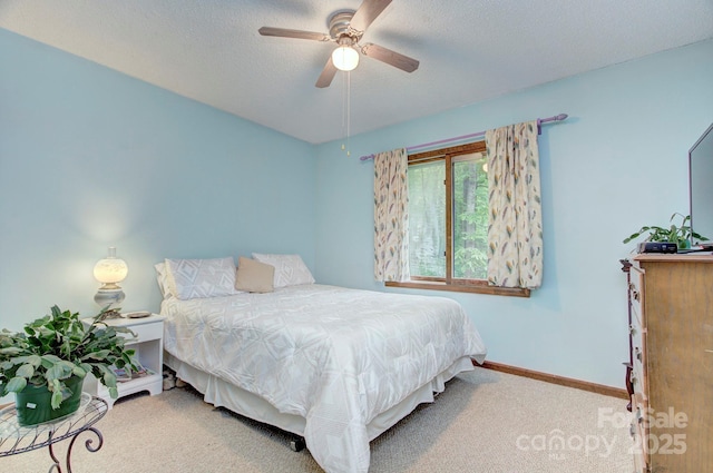 39 Oak Ct, Fletcher, NC 28732 - bedroom featuring carpet floors, baseboards, ceiling fan, and a textured ceiling