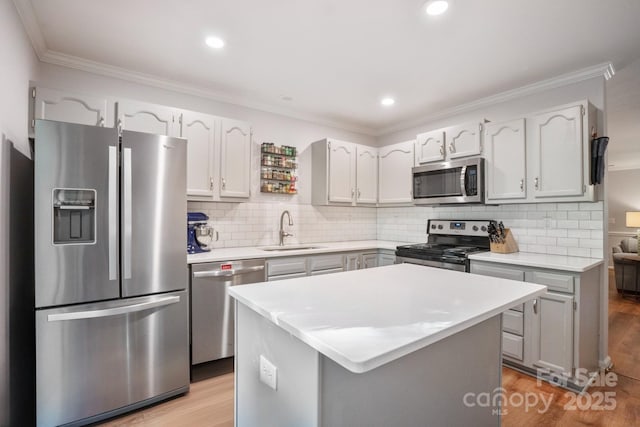 9214 Arbourgate Meadows Ln, Charlotte, NC 28277 - kitchen featuring a sink, appliances with stainless steel finishes, backsplash, and light wood-style flooring