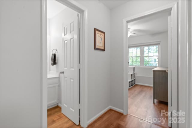 9214 Arbourgate Meadows Ln, Charlotte, NC 28277 - corridor featuring baseboards and wood finished floors