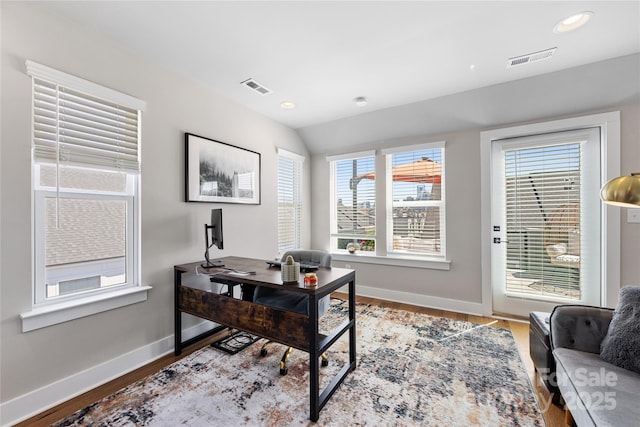 office area featuring visible vents, recessed lighting, baseboards, and wood finished floors