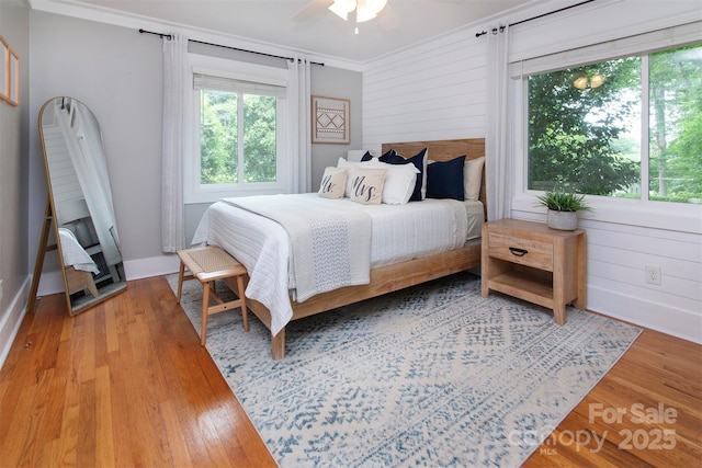 1514 Wensley Dr, Charlotte, NC 28210 - bedroom with light wood-type flooring, baseboards, crown molding, and a ceiling fan