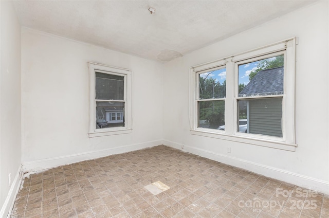 2622 Hemphill St, Charlotte, NC 28208 - unfurnished room featuring baseboards