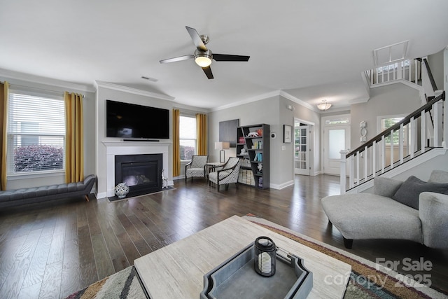 8702 Aspinwall Dr, Charlotte, NC 28216 - living area with a ceiling fan, wood finished floors, stairs, baseboards, and ornamental molding
