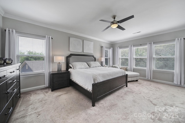 8702 Aspinwall Dr, Charlotte, NC 28216 - bedroom with baseboards, multiple windows, light colored carpet, ornamental molding, and ceiling fan