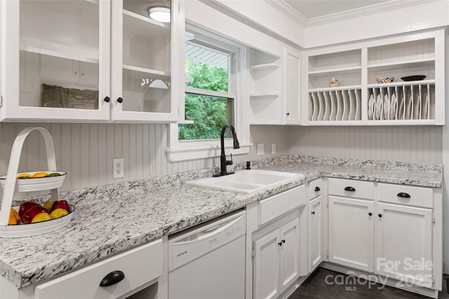 kitchen with crown molding, white dishwasher, open shelves, a sink, and white cabinetry