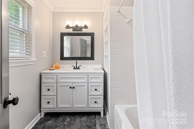 bathroom featuring vanity, baseboards, ornamental molding, and shower / bath combo