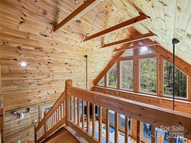 additional living space featuring wooden ceiling, wooden walls, and wood finished floors