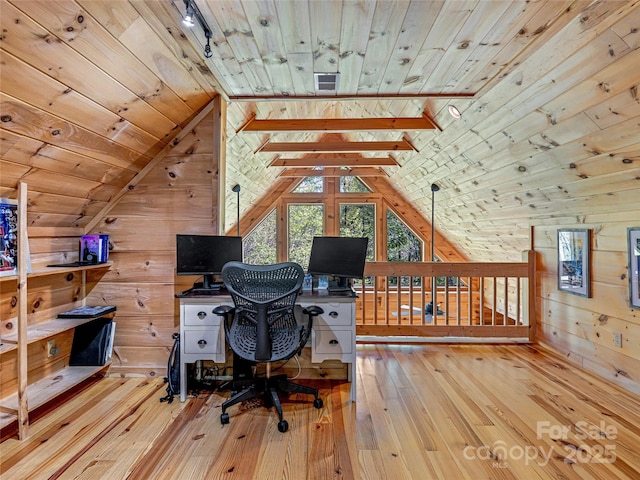 office area featuring wooden ceiling, wood walls, wood-type flooring, and vaulted ceiling