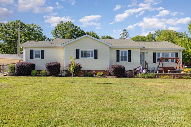 ranch-style house featuring a front lawn, crawl space, and a shingled roof